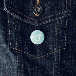 The Man Logo 25mm Button Badge - Inspired by The Killers