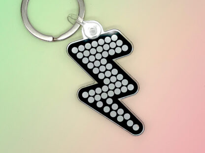 Battle Bolt 50mm Acrylic Keyring – The Killers Inspired Music Merchandise