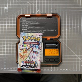 ~22.60g Pokémon TCG Prismatic Evolutions Booster Pack – Weighed, Sealed